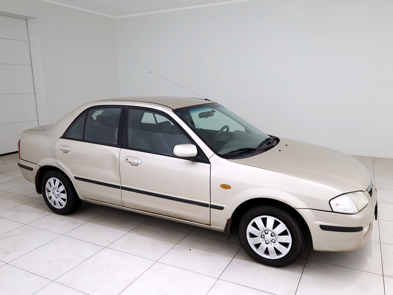 Mazda 323 1.5 65 kW - Photo 1